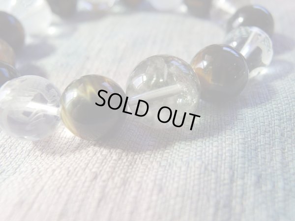 画像15: 極上虎眼と四神獣彫水晶と３種ルチル＆庭園水晶　　「虎砲」